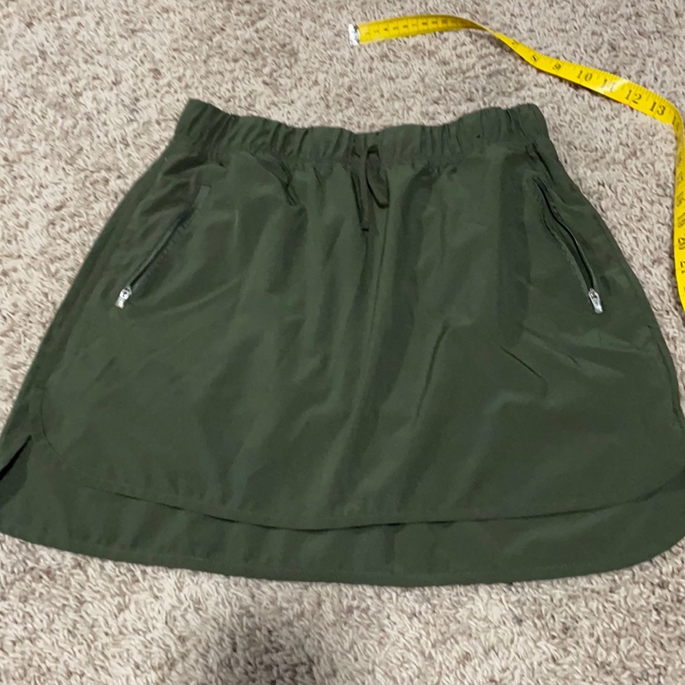 Athletic skirt with mesh attached shorts